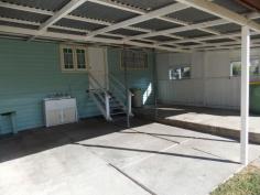 85 John Street, Rosewood, QLD - Bremer Valley Realty Two bedrooms + sleep-out & office 
* Lounge room with A/C 
* Modern kitchen open plan to dining with A/C 
* Renovated bathroom 
* Rear covered entertainment area 
* 878m2 block with room for a large shed 
* Walk to Rosewood shops & schools 