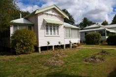  GOONDIWINDI, QLD, 4390 This solid cottage with 2 bedrooms and an enclosed sleepout is just oozing charm and character Both bedrooms open onto a delightful sunroom that just soaks up the winter sun. A large lounge in the centre of the home opens onto the enclosed verandah that is spacious enough to be used as a third bedroom. A separate small office runs off the dining area that adjoins the well laid out and compact kitchen that boasts a large pantry and room for a large refrigerator. The bathroom is quaint with the shower over the bath and a separate toilet. A lovely paved entertaining area is at the rear of the house set amongst an established garden. The yard is well fenced and has a large three bay shed. This delightful little home won't last long.   