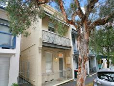  119 Curtis Road,Balmain NSW 2041 An abundance of great design ideas are presented in this light filled three level chic Balmain terrace conveniently located in the heart of Balmain. Fully renovated with great taste and style  with impeccable presentation, the home offers 3 bedrooms,  separate lounge and dining rooms ,luxury spa bathroom, integrated kitchen with stainless steel European appliances (gas cooking) and plenty of cupboard and work place. Filled with the warmth of natural timber and lots of light the living area opens to entertainer’s deck and  paved, leafy courtyard with water feature.  Genuine period features include fireplaces, iron-laced balcony, high ceilings beautiful polished floor boards. Convenience features are  plenty of storage, reverse cycle air-conditioning, gas heating connection, stylish glass balustrade, garden sprinkler system. Harbour Bridge and City Skylight views are enjoyed from the loft bedroom. Balmain village with restaurants, cafes, shops, ferry service and buses is only a short stroll away. 