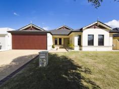 107 Sundowner Meander Banksia Grove WA 6031. Prepare to be wowed by this beautiful family home. Ticking all 
the boxes, this house is perfect for anyone looking to settle in a 
convenient and quiet location. Built in 2009 and set on a 569sqm block; 
this spacious property has it all. Featuring, a master bedroom 
with his & hers walk in robe, elegant feature wall, and a modern 
double vanity ensuite. 3 double bedrooms with built in robes, beautiful 
main bathroom with shower, bath and enclosed toilet. You can also
 tick off your list, a large open living area, spacious casual meals 
area, open plan kitchen with plenty of cupboards and bench top space, 
dishwasher and a great walk in pantry. Including, Separate dining room, 
ducted evaporative air-conditioning system, and ample space for large 
furnishings and comfort through out the home. Inside floors for living and wet areas are tiled and easy to clean, while the bedrooms and lounge have plush carpet. Outside
 boasts a large tidy yard, including, a good size alfresco, low 
maintenance grass area, an in-ground fibreglass, salt water swimming 
pool, with solar blanket and creepy crawler – Fantastic for entertaining
 family and friends! With a home so spacious and plentiful; the list goes on... • A great family layout with soft neutral walls and quality fittings • Easy to clean laundry, linen cupboard • Grass area for pets • Low maintenance reticulated gardens • Double lockup garage with side-back access and shoppers entry • Alarm system • Fully insulated • Quiet Street • Only a short distance away from bus stops, shops, parks and schools. Get in quick, at this price, this gem won’t last. 