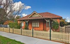 292 New Canterbury Rd Lewisham NSW 2049 Federation Family Home in Parkside Setting Set on a 398 square metre block adjoining Morton Park, this distinctive triple fronted Federation home with an additional 6 metre wide driveway is an excellent choice for both home buyers or investors alike. This surprisingly affordable family home with very well-maintained interiors and elegant original features, is perfect for those seeking an immediately comfortable home yet one which has further potential for improvement. This home incorporates three double bedrooms, plus a spacious study/fourth bedroom. There is also an inviting living room with stainglass windows, a separate casual dining area, a renovated bathroom and a modern kitchen which features a walk-in pantry, stone benchtops, a dishwasher, plus a stainless steel oven and gas cooktop. With a commanding street presence, this impressive home offers a long tessellated tile front verandah, polished timber floors, high ceilings, a security alarm, a large storage area and an external laundry. There is also off-street parking for up to four vehicles and a private sunny garden with a level lawn. Conveniently positioned, this very desirable home stands next to the playground of Morton Park and is in close proximity to select local schools, renowned eateries, Lewisham station and city light rail and bus transport.