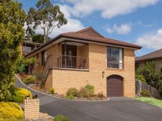  1/15 Anitra Close, Geilston Bay, TAS 7015 Yes, most definitely, free standing with only two on the block, a fully fenced back yard, extra parking for your Boat or Van and most importantly pet friendly. The home has expansive views Grasstree Hill in the distance, mountain ranges as the backdrop and a valley of homes in between. Very close to transport, shops and walkways and of course the Lindisfarne Village close by. The huge garage/workshop is underneath, a side staircase leads you up to the verandah and into the foyer which is at the far end of the lounge/dining room. Very sunny and warm showcasing the view. As you enter the kitchen there is a breakfast nook, opposite the large pantry and fridge. There are ample cupboards the bench top area will definitely suit. The laundry with more storage cupboards lead out to the back courtyard which boasts a level entry to the home. The bathroom is fully tiled, and well planned offering a vanity, separate bath and spacious shower. A hallway of storage cupboards is another plus with a separate toilet placed between the two bedrooms.  The master bedroom and second bedroom have built in wardrobes, both rooms an excellent size. The dcor is neutral, there are good quality carpets and curtains. Brick Veneer with a tiled roof and aluminum windows ensure this property to be low maintenance and set amidst quality homes in a quiet street. Better than the average unit most definitely it's a free standing cottage. 