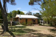  84 Brazier Street Denmark WA 6333 Step inside, it’s like a little log cabin! Beautifully presented 2 bedroom cottage with cork floors and fab décor. Outside, it sits on a sub-divisible duplex block, is opposite the Recreation Centre and an easy, level walk to town, shops, schools and the river. 