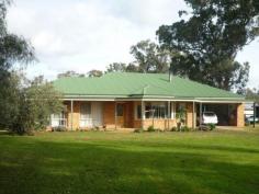 243 Ewings Road Avenel VIC 3664 This charming brick veneer home offers over 40 sqs of living, with a sought after rural setting yet close to all Avenel has to offer. Plus your chickens will be your new best friends when they move into their state of the art double storey chicken coupe!! * Stylish home on 1 acre with rural aspect on edge of Avenel township * 4 spacious bedrooms master with en-suite * Well appointed kitchen with Stainless Steel appliances & walk in pantry * Multiple living areas heated by slow combustion wood heater * Undercover outdoor entertaining area with built in BBQ * Separate paved gazebo complete with open fire * Large (5o’ x 30’) workshop with power, water & concrete floor * Extensive shedding, garden shed 6m x 3m & woodshed 6m x 2m * Raised veggie garden beds completely bird proof * Assorted varieties of fruit trees * Luxury 2 storey chicken penthouse