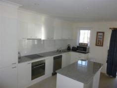  8/15-19 Mark St Forster NSW 2428 "Barini" - Holiday Unit > Immaculate first floor unit conveniently located approx 1 hour from Gloucester and within 300m to the waters edge along Little Street. > Featuring open plan kitchen/living/dining area, bathroom, internal laundry and separate toilet. > Modern fittings include grantie bench tops, dishwasher, reverse cycle air conditioning. > Enclosed private tiled deck and single lock-up garage. 
