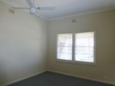  111 Currajong St Parkes NSW 2870 Web ID : 	 1724036 Price : 	 $200,000 Property Type : 	 House Sale : 	 Private Treaty Neat & Tidy 2 1 2 This two bedroom home is in an excellent position just a short stroll to the main street. Features include new paint and carpet, tidy bathroom and kitchen, large lounge as well as reverse cycle split system and ceiling fans. There is rear access, workshop and single garage. This is ideal for an investor or first home buyer. 