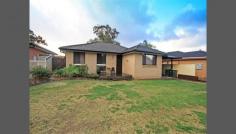  63 Helicia Rd Macquarie Fields NSW 2564 This Simply Won't Last Fantastic three bedroom family home with a treasure trove of extra's. Featuring large bedrooms, stunning bathroom, second toilet, updated kitchen with gas appliances, spacious lounge, dining and family areas. Also boasts carport plus garage, entertaining area and a great backyard for the kids. Ring today. 