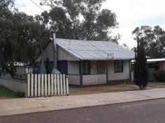  11 Henry St Toodyay WA 6566 WHAT AN INVESTMENT What value is this? 685sqm of land with a 3 bed cottage, open plan living with open fireplace and renovated kitchen and good old fashioned polished hardwood floors. There are two double size bedrooms and a good size back bedroom, laundry, separate toilet and bathroom with jarrah wood features. Decked veranda at the front and patio at the back with garden shed and secure area for your little dog. This cottage is ideal as a starter home, investor, a downsizer for a couple or roomy for a single. No great hills to climb to go shopping and just a stone's throw from the Medical Centre and Club. General Features Property Type: House Bedrooms: 3 Bathrooms: 1 Land Size: 685 m² (approx) Indoor Features Toilets: 1 Air Conditioning Other Features Close to Schools,Close to Shops,Fireplace(s),Polished Timber Floor 