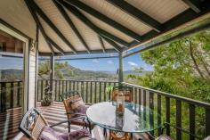  20 The Rampart Umina Beach NSW 2257 Price : 	 Offers over $650,000 Property Type : 	 House Sale : 	 Private Treaty Land Size : 	 1060 Sqms OUSTANDING FAMILY HOME IN THE HEIGHTS!! 3 3 4 STUNNING VIEWS WITH ROOM FOR 4 CARS!! Situated in one of Umina Beach's most private & exclusive locations is this outstanding & unique 3 bedroom 3 bathroom 2 storey home with multiple living areas & amazing views has to be seen to be appreciated!! The first floor of the home has vaulted ceilings for maximum space & light with a carpeted formal lounge room with split system A/C, a large double garage that is currently utilised as a 2nd living area, a powder room for guests & an open plan kitchen & dining area with timber floors, that leads out onto the covered deck allowing you to take in the sweeping district views. The ground floor is carpeted throughout with the large master bedroom featuring split system A/C with ensuite & the 2nd bedroom with built in robes, opening onto a private balcony. The 3rd bedroom with built in robes also has views across the district!  An enormous living area or potential 4th bedroom leads out to the fantastic wrap around timber deck that is ideal for entertaining & gives so much added living space that truly is unique for homes in this location. With level access from the street to the home & also the double garage with a double carport plus added space for 2 extra cars, their is more then enough parking for guests. Immaculately presented & positioned in an exclsuive location, with level access from the street, spacious timber decks that maximise the outdoor living space, vaulted ceilings & a stunning outlook, this versatile home is a rare opportunity for those buyers looking for an outstanding home with views & room to live!! MUST BE INSPECTED!! Contact Liam McAuliffe on 0432 448 154 to arrange an immediate viewing. To view more homes go to randwuminabeach.com.au Property Features Quiet LocationEntertainment AreaHeatingBathViewsBeach/Coastal PropertyAir ConditioningBuilt-insInternal LaundryPay TV EnabledRemote GarageBroadbandBalconySecure ParkingFormal LoungeNature PropertyPet FriendlyRainwater TankPrestige Property 