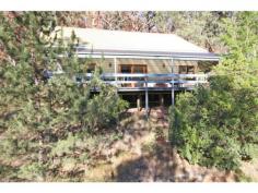 161 Upper Macdonald Rd St Albans NSW 2775 For Sale     $489,000 Features General Features     Property Type: House     Bedrooms: 2     Bathrooms: 1     Land Size: 12.95ha (32.00 acres) (approx) Indoor     Open Fireplace Other Features     Verandah, Water frontage, Water access A PERFECT TREE-CHANGE, 32 ACRES WITH CEDAR HOME- RIVER/VALLEY VIEWS This comfortable cedar two bedroom home sits on the hillside at St Albans, overlooking the meandering MacDonald River below. On 32 acres, with locally renowned Jack's Gully and Jack's Track leading through the property, it is ideal for bush walkers, nature lovers and those wanting to escape city life. The split-level home is north facing, with the verandah overlooking the bushland property and the river. The open plan kitchen, dining and living room are all spacious, with large timber cedar curtained windows throughout the house. Polished timber floorboards and high Cathedral ceilings give this home a roomy but cosy feel. The kitchen is sunny, and includes a new electric oven. The Living room has a great open fireplace which keeps the home toasty on cooler nights, and ceiling fans throughout the house keep it lovely and cool in summer. Both bedrooms are good sized with large windows capturing the bushland view, the bathroom is bright and roomy. There is also a separate toilet. The home has an electric hot water system, 7500 gallon concrete water tank, and concrete septic tank. It also has a colour bond roof and satellite dish for TV. The MacDonald River below is accessible via a portional river frontage, a great place to cool off during summer. There is some arable land at the base of the gully. Only 1.6kms from the the village of St Albans, this exquisite bushland property is private and peaceful. Call us for an inspection today! Paul - 0418 649 294 WFR Office - 4566 4660 All information contained herein is gathered from sources we believe to be reliable. However, we can not guarantee its accuracy, and interested persons should rely on their own enquiries. Property Code: 234 Inspections Inspections by appointment only. 