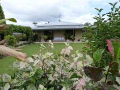  2 Wilson Street El Arish QLD 4855 SPACIOUS AND GRACIOUS You'll feel at home from the moment that you enter this Federation-style home with its colonial windows and wrap around patios on all sides. This sprawling home features 327m2 under roof and incorporates 177m2 of sandstone tiled patios which are wide and private, making entertaining a breeze on tropical nights. Roll-down blinds on the western side provide shade for the home and assist in keeping it cool during the day. The internal walls are solid concrete block and the living area of the home is a spacious 150m2 and features terracotta tiles which run on a 45 degree angle throughout.  The exterior is constructed of sandstone coloured split-face concrete blocks which are low-maintenance and add to the charm of this sprawling home. This large, 'corner block' home has two street frontages with two car cross-over access.  A cottage-style, low maintenance garden compliments this four bedroom family home with a modern, country-sized kitchen built of solid timber -Queensland Maple- which is fully equipped with all the modern conveniences. Stone benchtops, kitchen servery to the outdoor entertainment area, huge, full height, corner pantry, gas cooktop. General Features Property Type: House Bedrooms: 4 Bathrooms: 3 Land Size: 999 m² (approx) Indoor Features Air Conditioning Outdoor Features Garage Spaces: 5 