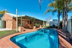  12 Memorial Dr Wodonga VIC 3690 Auction Saturday 11-Oct-2014 @ 11:30am Internet ID 306533 Property Type House Features Air conditioning, Remote garage, Study, Dishwasher, Built in robe/s, Ducted cooling, In-ground pool, Fully fenced, Ducted heating Floorplans Floorplan 1 Floorplan 2 Summer Fun For the FamilySimply move in with nothing to spend.  *3 Bedrooms with ensuite and WIR to master *Freshly painted with brand new carpet installed  *Blackwood timber kitchen  *Ducted heating and cooling *2 large living areas  *In ground salt pool *Garden shed plus tank *Room for caravan *Double lock up garage with remote  *All on approximately 793m2 