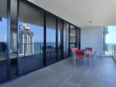  1461/9 Ferny Avenue Surfers Paradise Qld 4217 This sub penthouse is on the 46th floor of south tower with 2 huge balconies. The large one faces east with views from Coolangatta to South Stradbroke. The apartment opens onto a tiled entry with guest powder room and separate laundry. There are three large bedrooms, the master has a full ensuite with ocean view. The second and third bedrooms are located on the opposite side of the unit and have a shared bathroom with ocean and hinterland view. The kitchen has a gas stove and electric oven, double dishwashers and a huge stone top island bench. 
