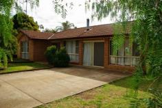  10 Apsley St Wellington NSW 2820 Property Description Imposing in size, Impressive in value! Located in an area with no through traffic and only a short distance to the heart of town you will find this inviting brick veneer home ideal for family living. Its back yard is huge and there is a rear lane access so if you want to add a garage/workshop to the existing line up, then there is plenty of room to do so. (Subject to Wellington Council Building Requirements) There are five bedrooms – master bedroom with ensuite bathroom, four with built-in wardrobes plus a study/computer room. The main bathroom is certainly spacious with both bath tub and separate shower recess. It had also previously featured a lush outlook from its big windows to an adjacent fernery. The bones are still in place and just require some replanting to bring this unique outlook back to life. There is a separate lounge room with a combustion heater plus the dining room is adjacent to the galley style kitchen. A large property without the large price tag. Images reflect properties at the time when the photos were taken. Seasonal changes & maintenance can affect the current presentation and prospective purchasers are urged to use them as a guide only. 