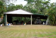  Bilyana QLD 4854 This beautifully maintained house is set on approximately 41 hectares of land with a creek. The property features 3 bedrooms, 2 of which are air-conditioned and all 3 have built-ins and fans. Separate bathroom and toilet are on a raised split level. Kitchen has a dishwasher and plenty of cupboard space. Living area has polished Red Tulip Oak floors and a split system air conditioner. There is a large 28 x 12.5 metre shed, and the property has a 29 hectare irrigation licence from Deep Creek. 