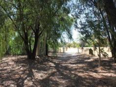  11 Caponi Rd Barragup WA 6209 Drive up the picturesque drive of the fully fenced property towards the 
old Fibro home, set only metres from the river. This 4.96ha sub 
dividable rural block can be split into two. You can keep one and sell 
the other. Power and scheme water are connected to the property. Build
 your dream home away from it all but only minutes from Mandurah's 
Coffee Strip, Shops, Schools, Transport, Spud Shed & Freeway. Call Ian Lay today 0407 479 747 to arrange your viewing.
 