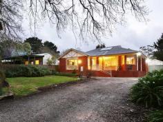  7 Station Road Gembrook VIC 3783 Modern Brick Home in Peaceful Location The flexible layout of this immaculately maintained and presented home would suit a small family, or couple - young, old or anywhere in between. The two generous living areas capitalise on the views towards the valley and Puffing Billy Railway track. The first, with hardwood floors, has a well-appointed kitchen, dining and lounge area all-in-one which suits the modern lifestyle of cooking, entertaining and hanging out together. The more formal carpeted living space means you can close the door on the day and enjoy the peace and quiet. With three great sized bedrooms arranged at the rear of the property, the master with en-suite and walk-in-robe, and one bedroom with dual access (could be a study and/or guest room). The main bathroom is positioned between bedrooms 2 & 3 with separate toilet down the corridor. And there is built-in storage galore! Outside the low maintenance garden front and back could be developed or left as is for easy care. A water-tank collects water from the garage roof for use on the garden and a small shed at rear for all your gardening bits and bobs. General Features Property Type: House Bedrooms: 3 Bathrooms: 2 Building Size: 1,108.00 m² (119 squares) approx Land Size: 1108 m² (approx) Outdoor Features Garage Spaces: 2 Other Features Built-In-Robes, Close to Schools, Family Room, Formal Lounge 