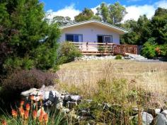  92 Barton Avenue Triabunna Tas 7190 Sheltered at the end of the popular Barton Avenue is this delightful 3 bedroom cottage on a large allotment of 5798m2 (approx. 1.43 acres) overlooking the bay. Just a short distance from the property are boat ramp, coastline walks and the popular tavern and resort development. The property has convenience of town water. 