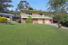 20 Piggabeen Rd Tweed Heads West NSW 2485 Just minutes from the white sand of Coolangatta, this elevated home offers great family living at an affordable price. 
Ideal for a growing family or those with teenagers requiring their own 
space, the lower level of the home offers a living room with wet bar, 
separate bedroom/home office and a shower and toilet. 
Upstairs, the main living quarters include an open plan dining and 
kitchen area and a large living room, all of which are tiled. The living
 room leads through sliding doors to the front balcony, while the dining
 room opens out to the spacious, fully fenced backyard. A perfect size 
for the kids to play, with enough room for a pool if desired (STCA). 
The kitchen has been renovated in fresh crisp tones with stainless steel appliances including a dishwasher. 
Three well proportioned bedrooms offer built in wardrobes and two access the front balcony that runs the length of the home. 
The refurbished bathroom features floor to ceiling tiles and a bathtub and there is a separate toilet. 
A spacious double lock up garage completes the picture. 
In a great location just minutes from all the Tweed and Southern Gold 
Coast has to offer, call today to arrange an inspection of this quality 
family home. 