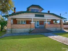  155 NE Rd Manningham SA 5086 LANDMARK GENTLEMAN'S BUNGALOW ON HUGE ALLOTMENT Inspection Times: Sun 14/09/2014 02:00 PM to 02:30 PM OPEN FOR INSPECTION SATURDAY 13TH AND SUNDAY 14TH SEPTEMBER 2:00PM - 2:30PM  Centrally sited on a large parcel of land and on an elevated corner position this home enjoys spectacular views stretching from the Hills to the Coast.  The imposing entrance with solid sandstone columns and the exceptionally large floor plan gives an idea of the former grandeur of this home. There is plenty of potential for the keen handyperson to restore to its original grace and style.  An impressive entrance foyer with rich wood paneling, lofty ceiling, and a sturdy wooden staircase leading to the second level with solid Jarrah floor. Leading from this area is the huge formal lounge with matching timber and glass French doors, an open fireplace with timber surround, sensational timber coffered ceilings and large window allowing loads of natural light and capturing the breathtaking views.  The large kitchen has copious cupboards – enough to suit the most fastidious buyer and chef, a dishwasher and gas appliances.  Two rooms conveniently lead from the kitchen, both quite imposing with the continued theme of Jarrah floors and coffered ceilings. One is used as a formal dining area, the other a large family room complete with large bay window, box seating and a timber surround gas fire.  The large floor plan comprises four bedrooms. A generous main bedroom and second on the ground level and a further two bedrooms on the second level. The home enjoys fabulous picture perfect views but they are absolutely stunning from the second level.  The good size family bathroom is on the ground level. There is also a generous laundry area with plenty of storage plus separate toilet and hand basin.  There is abundant space for outdoor living with covered areas and a large lawn area which with a little TLC could be returned to its former use as a grass tennis court. Lots of fun for the family.  Some of the other features apart from location include reverse cycle air conditioning, three car garage, additional handyman shed and tall brush fencing which surrounds the property, making it completely private and secure.  This is a home offering privacy and prestige with loads of potential. A rare and exciting opportunity to secure a family home of considerable substance.  General features:  Property type – Gentleman's Bungalow  Bedrooms – 4  Land size – 1500 square metres (approx.)  Outdoor features:  Garage spaces – 3  Potential tennis court 