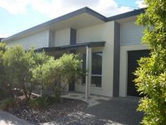  26/266 Henty Drive Redbank Plains Qld 4301 Price $235,000.00 StateQLD Town VillageIpswich & West Moreton SuburbRedbank Plains Postcode4301 Property TypeTownhouse Building Size116 m2 Year Built2009 7% Gross Return - Investors Take Note - Positively Geared As new 3 bedroom, 2 bathroom Stand alone house, located in the sought after Canaan Rise Complex offering up a fantastic investment opportunity.  On entry to the residence you are welcomes with a nice open plan arrangement encompassing large Air-conditioned lounge room, dining room, and leading to a modern kitchen, with an outlook onto a landscaped back terrace. The three bedrooms are more than ample in size, with the main bedroom containing its own en-suite. There is a separate laundry, and remote garage. Being sold unfurnished but including Split System Air-conditioning system, Dishwasher, Window coverings, Remote Control Garage, Water Tanks. Good Tenants in place paying $310 per week. on a years current lease. Body Corporate Fees: $750 per Qtr Council Rates: $365.00 per Qtr You have to seriously consider this if you want a solid investment which is just about positively geared. Phone Adam Rizzo on 0430343611. 