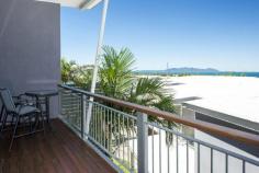  10/13-15 Terrace Place Nelly Bay Qld 4819 This two bedroom townhouse is well-located on Nelly Bay beachfront, close to shops, cafes and the marina. * The top floor of the townhouse features a large open-plan living area opening onto a balcony with panoramic water views across to the mainland. * The property is fully air-conditioned with ceiling fans throughout and beautiful polished wood floors with tiles to the wet areas. 