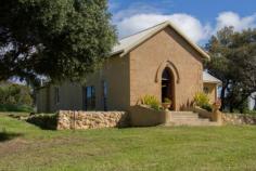  50 Brigid Rd Bootenal WA 6532 Beautiful stone Church Situated only a short 10 minute drive from Geraldton on Edward Rd and then West onto Bridgid Rd lays this gorgeous Stone Church. Built in 1874 as a catholic church this unique property has been converted into a house complete with modern kitchen and large bathroom with roman bath/shower. There is one main bedroom but a second or third could easily be added. The 9.45 acres are a mix of heavy clay and sandplain and have established trees and bush. It also has amazing views looking east as far as the windfarm. The heavy clay country would be ideal for horses/ponies or a few sheep. The property is served by mains water and has several bores and a well (all unequipped) There is also a lock up shed with power which would also make a great stable if required.  The possibilities for further transformation of this lovely old home are endless. Follow the link below to view what can be possible. Your imagination just may run amok. 