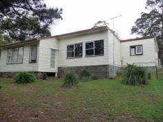  5090 Tasman Highway, BUCKLAND TAS 7190 Affordable Country Retreat This affordable property is a drive of approximately 20 minutes from Sorell, with Orford being a further 15 minutes away. The weatherboard house is positioned on a bush block of 6822 m2 that has fences around all boundaries and includes a stable for your horse and kennels for the dogs. As well as areas of cleared land there are also numerous trees, bushes and a dam close to the main entrance off the highway. The spacious home has two bedrooms and a sunroom that could serve as a third bedroom if required.  The lounge room, kitchen and dining area are all good sized rooms suitable for families. These are neat and tidy areas just like the bathroom and laundry. A large carport attached to the house provides plenty of sheltered parking and could also be used for outdoor entertaining. This property would be ideal for first home owners looking for something in the country with a bit of land, or would be a good rental for investors. 