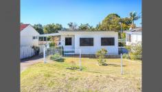 88 Old Belmont Rd Belmont North NSW 2280 Just a short stroll from Belmont North Public School, this gorgeous 4 bedroom home has plenty of space for a growing family. As you walk into the home you will be greeted by plenty of natural light, and soon realized that it is deceptively large on the inside. With an abundance of entertaining area, the home features a large dining area, a separate living area, and a gigantic fourth bedroom which could easily be used as a rumpus room or teenagers retreat. With a second bathroom in the laundry, the home makes it very easy to give the kids their own space. Coupled with a large back yard, it's certainly not short on space. And to help in keeping the house de-cluttered there is a huge storage area below the rear deck. Parking is easy, with a car port beside the house, and an automatic single car garage below the fourth bedroom. There is plenty of room to turn a car around in the back yard. The deck out the back is set at an ideal height for a beautiful breeze in summer, and it's great for watching the native birds. It is covered, so it's a great space to use in any weather. With over $10k worth of Crimsafe security doors and windows, and a fully fenced and secure backyard, you can sleep easy at night. Extra Features: - Sensor lights above garage door and on deck - 44 power points throughout the home, all on trip switches - Foxtel outlets in lounge and sunroom - Insulated roof - Additional Outside Toilet 