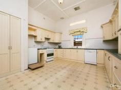  155 NE Rd Manningham SA 5086 LANDMARK GENTLEMAN'S BUNGALOW ON HUGE ALLOTMENT Inspection Times: Sun 14/09/2014 02:00 PM to 02:30 PM OPEN FOR INSPECTION SATURDAY 13TH AND SUNDAY 14TH SEPTEMBER 2:00PM - 2:30PM  Centrally sited on a large parcel of land and on an elevated corner position this home enjoys spectacular views stretching from the Hills to the Coast.  The imposing entrance with solid sandstone columns and the exceptionally large floor plan gives an idea of the former grandeur of this home. There is plenty of potential for the keen handyperson to restore to its original grace and style.  An impressive entrance foyer with rich wood paneling, lofty ceiling, and a sturdy wooden staircase leading to the second level with solid Jarrah floor. Leading from this area is the huge formal lounge with matching timber and glass French doors, an open fireplace with timber surround, sensational timber coffered ceilings and large window allowing loads of natural light and capturing the breathtaking views.  The large kitchen has copious cupboards – enough to suit the most fastidious buyer and chef, a dishwasher and gas appliances.  Two rooms conveniently lead from the kitchen, both quite imposing with the continued theme of Jarrah floors and coffered ceilings. One is used as a formal dining area, the other a large family room complete with large bay window, box seating and a timber surround gas fire.  The large floor plan comprises four bedrooms. A generous main bedroom and second on the ground level and a further two bedrooms on the second level. The home enjoys fabulous picture perfect views but they are absolutely stunning from the second level.  The good size family bathroom is on the ground level. There is also a generous laundry area with plenty of storage plus separate toilet and hand basin.  There is abundant space for outdoor living with covered areas and a large lawn area which with a little TLC could be returned to its former use as a grass tennis court. Lots of fun for the family.  Some of the other features apart from location include reverse cycle air conditioning, three car garage, additional handyman shed and tall brush fencing which surrounds the property, making it completely private and secure.  This is a home offering privacy and prestige with loads of potential. A rare and exciting opportunity to secure a family home of considerable substance.  General features:  Property type – Gentleman's Bungalow  Bedrooms – 4  Land size – 1500 square metres (approx.)  Outdoor features:  Garage spaces – 3  Potential tennis court 