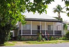  13 Robert Street Bellingen NSW 2454 Our Vendor's Have Made it Clear - We Want An Offer! A classic old style gem in a great location. Location certainly counts when looking to purchase your own home or investment property. This property is no exception - a flat walk close to town.  This quaint 3 bedroom old style home has been tidied up ready to move into or add your own touches to create your own home and give it the ambience it deserves.  The bedrooms are generous in size with high ceilings with built-ins in the master bedroom. The lounge with slow combustion fireplace provides warmth and that cosy feeling on the occasional chilly nights.  The kitchen/dining with servery to the lounge room has loads of bench space and leads to the North facing sunroom/family room. The newly renovated bathroom maintains the 1950's feel that this home is endowed with.  There is a large carport and two zinculume storage/garden sheds for all purposes in the back yard, which has easy access from the lane alongside the house.  With views overlooking a beautifully maintained Park, which provides a huge playing area for your children, play with your dog, kick a footy or have a game of cricket.  General Features Property Type: House Bedrooms: 3 Bathrooms: 1 Land Size: 417 m² (approx) Outdoor Features Carport Spaces: 1 