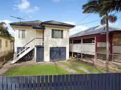  14 GERLEE Tennyson Qld 4105 FULLY RENOVATED, VERY WELL MAINTAINED, POLISHED FLOORS THROUGHOUT, SPACIOUS LIVING, 3 LARGE BEDROOMS, EAT-IN KITCHEN, DECK, SECURE GROUND LEVEL
UNDER CONTRACT. This immaculate highset three bedroom home has been fully renovated including newly painted interiors throughout, freshly polished floors throughout, a new large contemporary eat-in kitchen with quality finishes and a generously proportioned stylish modern bathroom.

Outstanding features of this property include the large living area which creates an abundance of space to spread out and creates an open and relaxed ambience for the property. The spaciousness of the living area provides the opportunity for multiple uses including different configurations of dining, lounge and study area to suit your lifestyle.

The property is situated on a level and fully fenced 405 square metre allotment. The ground level including laundry is secure and includes accommodation for two cars and ample storage and work areas. A rear covered balcony features a pleasant outlook over the large back yard back against a backdrop of trees. 