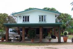  Bilyana QLD 4854 This beautifully maintained house is set on approximately 41 hectares of land with a creek. The property features 3 bedrooms, 2 of which are air-conditioned and all 3 have built-ins and fans. Separate bathroom and toilet are on a raised split level. Kitchen has a dishwasher and plenty of cupboard space. Living area has polished Red Tulip Oak floors and a split system air conditioner. There is a large 28 x 12.5 metre shed, and the property has a 29 hectare irrigation licence from Deep Creek. 