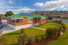  10 Fairway Crescent Riverside TAS 7250 A Key Location Conveniently positioned, this brick home would suit those looking for a starter, project home or investment property. Located in a great location, it’s an easy flat walk to the Riverside schools, specialty shops and Supermarket. Freshly painted throughout and with new carpet there is still some opportunity to put your own stamp on it to make it your own. Solar panels are a fantastic bonus as is the efficient heat pump hot water system and ducted heating making your low electricity bills a pleasure to receive. Sunlight floods the living areas through the large picture windows. A spacious separate lounge can be closed off from the kitchen/dining/family room. These areas have warm polished floor boards which offset the neutral wall color.  The kitchen has a good amount of preparation area and cupboard space. It also overlooks the backyard where you can watch the kids play whilst you cook the evening meal. With 3 bedrooms in total, the master would fit a king sized bed and is complimented by wall to wall wardrobes. With a vast amount of cupboard space through the home, storage should never be an issue.  The bathroom and laundry could be further enhanced with a modern make over. Outside, the gardens are neat and tidy with some established plants and useable lawn area. A single garage provides space for the car or the home handy man. This cute red brick home has great street appeal with a nice homely feel. Make sure you don’t delay and inspect this one now! 