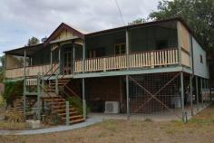  89 Alice Street Mitchell QLD 4465 OLD QUEENSLANDER - DOUBLE STOREY 5 Bedrooms (4 Built-ins), Office, Lounge/Dining, Kitchen, Bathroom, Laundry, Bar Area with Double Door Fridge. Dog Pens. Carport. 2127m2 Fully Fenced Block. Opposite corner store, and close to school and church. General Features Property Type: House Bedrooms: 5 Bathrooms: 1 Land Size: 2127 m² (approx) Price per m²: $118 Indoor Features Air Conditioning Eco Friendly Features EER (Energy Efficiency Rating): Low (0.0) Other Features Deck 