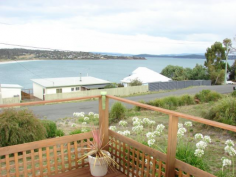  30 Carlton Bluff Road Primrose Sands TAS 7173 This brick veneer home has a spectacular 
view of Primrose Sands beach and the bay from the living areas and deck. 
Featuring 2 bedrooms, open plan living, 3 storage/garden sheds, outdoor living 
area at the rear and a viewing deck off the lounge area. This top side of the 
street home is unlikely to have its view impaired by future building. The floors 
are tongue & groove Tas oak with a tiled kitchen. You want a water view? - 
then you MUST inspect. 