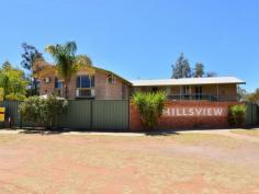  4/16 Bradshaw Drive Gillen NT 0870 With prime elevated views of Heavitree Gap as well as panoramic East and West MacDonnell Range views it will be hard to stop looking.  This two bedroom first floor unit has all the trappings of the ground floor units without a private yard. There is still plenty of common area to enjoy a social BBQ, swim in the pool or just read a book in the resort style garden setting. The entire unit has vinyl flooring and ducted evaporative air throughout. Open plan living is the theme in the lounge, dining and kitchen areas while the bathroom has a bath, shower and toilet. A real bonus with this unit is a 12m x 6m insulated shed that has had a lot of detail added to the inside. Divided into sections to accommodate a garage, a storage area and a games room/studio it is still diverse enough to cater to an individuals specific needs.  The grounds are immaculate and recent kerbing, bitumen & line marking make private off street parking a breeze.  Priced to sell to either the astute investor or happy home owner. 