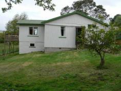  18 Main Rd Lanena TAS 7275 Quaint, Attractive & Desirable This most attractive compact cottage on 1.25 acres is situated just minutes from Exeter and only 25 minutes commute from Launceston. The main bedroom faces east to catch the morning sun and there is a second small bedroom. The lounge and separate dining room area both look out over the garden with doors to a deck from the lounge to sit out on in the better weather looking over the remainder of the block. This property has huge potential here to expand this into 3-4 bedrooms with a larger deck and take advantage of the position and views. There is good access and a view of the main road from the driveway allowing easy ingress and egress. Plus there is a stack of room for a pony, fowls and a veggie garden or landscape the whole block. The property is currently tenanted at a good return and you could reap these rewards while planning your next move. Inspection by appointment only. 