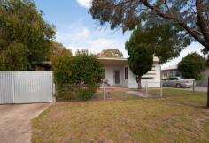 470 Griffith Rd Lavington NSW 2641 Neat and tidy 2 bedroom plus study home offering 2 good sized living areas, one of which could be turned into a 3rd bedroom if required. Massive kitchen with gas cooking, dishwasher and air conditioning, gas heating & evaporative cooling. Polished floorboards to front lounge room and hall, carpet to sunroom and bedrooms. Plenty of secure parking includes; single carport behind gates, another double carport behind gates and a massive 4 car lockable garage! All this situated on a great sized block with secure yard for kids / pets to run! Zoned B4 this property has potential as a commercial premises. Presently renting at $200 per week the block is 981m2. Property Features Property ID     10102863 Bedrooms     3 Bathrooms     1 Garage     4 Single carport, double carport & 4 car lock-up garage Carports     3 Single carport, double carport & 4 car lock-up garage Inclusions     Fixed floor coverings, curtains, blinds, light fittings, T.V antenna Land Size     981 Square Mtr approx. Rental Return     $200 Weekly Actual Rates     $1447.05 Yearly