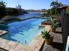  107 Sunshine Blvd Mermaid Waters QLD 4218 OPEN: SAT & SUN 12-12:30PM!! Overseas Transfer Forces Sale House - Property ID: 745765 This north to water townhouse is bigger than the average house. Comprising expansive split level living area overlooking the pool and canal, kitchen with separate dining area, second large living area, three bedrooms, study, three bathrooms and located within walking distance to Pacific Fair, Jupiters Casino, Broadbeach and the beach.  The vendors have been transferred overseas and reluctantly have to sell this impressive property creating the perfect opportunity for a lucky buyer to purchase this low maintenance freestanding townhouse in such a great location. With the light rail, upgrades to Jupiters and Pacific Fair the prices can only go up, so what are you waiting for. Features:- - 3 bedrooms - Study - 3 bathrooms - 2 living areas - Single lockup garage - Pool - Pet friendly Due to State Government Legislative requirements, to bid at auction photographic ID is required for registration. The deposit is due to be paid immediately after the fall of the hammer on auction day unless other prior arrangements have been made.  For further information contact Evelyne Castaldi.   Print Brochure Email Alerts Features  Built-In Wardrobes  Close to Shops  Close to Transport  Secure Parking 