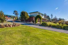  307 Winkleigh Rd Exeter TAS 7275 Property Information This superbly presented residence is located just on the edge of Exeter, in an elevated position looking over the surrounding countryside. The post and rail fences invite you to drive in, with the option of which garage door to open with the remote, or pull-up outside on the large parking area. The home offer generous sized rooms throughout, including the near new kitchen, the 3 downstairs bedrooms; 1 a separate sitting room currently; the 2 bedrooms upstairs; all immaculately maintained and presented. The main bedroom has an ensuite and a walk in robe; more the size of another room; the others built-ins. The sunny living area opens onto the patio and verandah and enjoys the gorgeous rural outlook. Outdoors there is the double garage + workshop, a dog run and tack shed, with 2 paddocks now, 3 paddocks an easy option - room for the pony! Exeter's village shops, both high and primary schools, Doctors and bank are a 2 minute drive, with Launceston only 20 minutes away. Floor Area 	 224 sqm Land Size 	 7942 sqm Tenure 	 Freehold Approx year built 	 1985 Property condition 	 Excellent Property Type 	 House Garaging / carparking 	 Double lock-up, Auto doors (Number of remotes: 2) Construction 	 Brick veneer Joinery 	 Aluminium Roof 	 Iron Flooring 	 Tiles and Carpet Window coverings 	 Drapes, Blinds (Timber) Heating / Cooling 	 Woodfire, Ducted Chattels remaining 	 All fixed floor coverings, all light fittings, all window furnishings, wood heater, Bosch dishwasher, convection microwave, wall oven, cooktop, remote garage door system x 2, garden shed, dog run, clothes line. Kitchen 	 Designer, Dishwasher, Separate cooktop, Separate oven, Rangehood, Double sink, Breakfast bar, Microwave and Pantry Living area 	 Open plan Main bedroom 	 King and Walk-in-robe Ensuite 	 Separate shower Bedroom 2 	 Double and Built-in / wardrobe Bedroom 3 	 Double and Built-in / wardrobe Bedroom 4 	 Double and Built-in / wardrobe Bedroom 5 	 Double and Built-in / wardrobe Main bathroom 	 Bath, Separate shower Laundry 	 Separate Workshop 	 Combined Views 	 Private, Rural Outdoor living 	 Entertainment area (Partly covered) Fencing 	 Fully fenced Land contour 	 Flat Grounds 	 Backyard access, Tidy, Other (tack shed and dog run) Garden 	 Garden shed (Number of sheds: 1) Water heating 	 Electric Water supply 	 Town supply Sewerage 	 Septic 