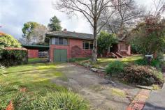  3 Alto Avenue Croydon VIC 3136 Welcomed by a wide frontage this classic original clinker brick 1940's home offers high ambitions to renovate or rebuild the dream, the choice is yours in what is considered to be Croydon's best address. This five bedroom home displays timeless original features including high ceilings, ornate cornices and picture rails which provides potential for those with creative vision to bring together classic architecture with new modern designs. A large light filled lounge/dining room with original hardwood floors and working open fireplace creates a warm ambient feel complimented by gas ducted heating throughout. - See more at: http://croydon.harcourts.com.au/Property/579734/VCC4429/3-Alto-Avenue#sthash.xOkNTrEc.dpuf 