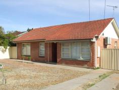  7 Gulf Street Port Augusta SA 5700 Property Description Trendy Reno! This well built home has been extensively renovated to provide a modern trendy look. The beautiful polished floors perfectly contrast the neutral tones making for a light, bright and open feel. Featuring good size lounge, 3 big bedrooms, modern kitchen with polished timber bench tops and S/S dishwasher, dine area, ultra modern bathroom with bath and nicely tiles laundry. Split system air conditioning to living and master bedroom plus quality fixtures and fitting complete the inside package. Outside features a big block with room to move, good shedding with shady annex, neat front garden with extensive paving including 2 driveways. If you are a first home buyer looking for a home that you don’t have to find more money to renovate then this one is for you! Inspection highly recommended 