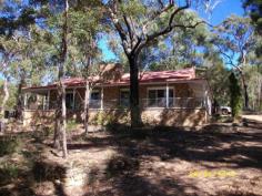  415 Wheelbarrow Ridge Rd Colo Heights NSW 2756 $590,000 Or Near Offer Wonderful double brick home set in the peaceful location of Colo Heights. This home offers 2 large bedrooms with built in robes, 2 bathrooms, and an open plan lounge and dining with large open fireplace and kitchen with fuel stove. This beautiful property features a wrap around verandah making  it easy to enjoy the views and a well sized lock up garage with 2  large water tanks on 120 acres! Property Features Property ID 	 6105882 Bedrooms 	 2 Bathrooms 	 3 Garage 	 2 Kitchen 	 Open plan kitchen with full wood oven Lounge 	 Open wood fire place Back Yard 	 120 Acres Facilities 	 Additional shower & toilet located in Garage Flooring 	 Concrete, carpet & tiles Security 	 Back base to alarm system Land Size 	 120 Acre approx 