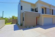  1/12 Water Street, BUNDABERG SOUTH QLD 4670 Welcome home to your new convenient city-side lifestyle property! This gated community of three is far and above your average Bundaberg townhouse configuration in style, size and even price! At over 235sqm's (plans available by request) under roof it truly dwarfs any other gated community property in town with all the modern appliances and at nearly six years old it hasn't aged a day in design. The kitchen alone is spacious and perfect for entertaining with a large pantry, stainless steel appliances (including classy gas cooktop) and plenty of cupboard space. Other inclusions to make your home-life a pleasure; two whopping air conditioned living areas (upstairs / downstairs), outdoor area with private courtyard, three built-in bedrooms (main is huge with great views of the CBD lights at night, air conditioning, ensuite and walk-in robe), large main bathroom with shower / bath separate and three toilets for added convenience. There is also a double automatic door lockup and off street parking within the confines of a secure gated community to give you peace of mind - the occupants of the neighbouring townhouses are also great! Your external maintenance is covered by body corporate so you won't even need to own a mower or a whipper snipper. Vacant and available to be inspected anytime, contact the Agent or view at the scheduled open homes. ***Please note in the interests of disclosure RealWay Bundaberg informs all prospective buyers that this property did not have any flood water enter the home during the 2013 flood disaster and is currently insured against any future flood-related catastrophe's.   