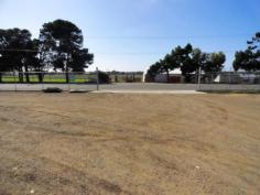 24 Proper Bay Rd Port Lincoln SA 5606 $590,000The land is made up of adjoining allotments (2 separate titles) with an 
area totalling 6406 m2. Originally set up as a truck depot it is now 
operated as a construction company compound. Improvements include a well
 laid out workshop with wet areas and concrete apron, waste oil facility
 and quality fencing with newish security gate. There is excellent 
access from Proper Bay Road and can be utilised for various 
applications. The current zoning is Industry. 