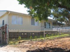  13 Ashton Street, Narrandera, NSW 2700 Tidy home on large block. Open plan lounge, dining and kitchen area. Carport. Large yard. 