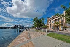 22/2 Belmont Street Swansea NSW 2281 It doesn't get much better than this! Watch the boats sail by. 
										 Spacious apartment 
located in Swansea's premier waterfront location Paris Apartments. 
Situated in this secured building overlooking Swansea Channel, you will 
enjoy sweeping views of Lake Macquarie. Upon entering the 
apartment you are met by a large dedicated foyer, which allows you to 
greet visitors whilst still maintaining privacy in the living areas. Moving
 through the foyer you walk through to the large air conditioned open 
plan lounge, dining and kitchen area. Also opening onto this area is a 
large room which could either be another living area, study or with the 
addition of a simple gyprock wall, a generous 3rd bedroom. The 
living areas flow out to a large, sunny tiled deck, the perfect place 
for entertaining and taking in the spectacular view. The generous 
kitchen is complimented by stainless steel Blanco appliances and granite
 benchtops. The 2 bedrooms in the apartment both feature large 
walk through robes, with the main enjoying an ensuite and the 2nd 
bedroom enjoying ensuite like access to the large main 3 way bathroom. With a dedicated parking bay plus single garage, car accommodation and storage is taken care of.  