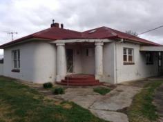  26 COMMON STREET GOULBURN NSW 2580 5 acres of land PLUS house 4km from CBD Zoning B6 and E3 House was built in 1950 180sqm living area Old sheds out the back   