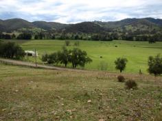  83 Dungowan Creek Rd Dungowan NSW 2340 Situated in the picturesque Dungowan Valley, approx 27km to Tamworth CBD. The
 property has a great mixture of creek flats and hill grazing. With 
approx. 25 Acres of extremely productive creek flats you have the 
potential to grow Lucerne or seasonal crops. The remaining approx. 37 
Acres is hill grazing. The property
 has more water than you will ever need. Single frontage to The Dungowan
 Creek, a 78 megalitre irrigation licence from an equipped electric 
well, 3 phase power connected. The well is also equipped with a stock 
and domestic pump that pumps to a storage tank and feeds troughs. The 
property is also connected to the Dungowan pipe line and 10,000 gallons 
rain water storage. Water will never be a problem. Current owner runs 26 cows and calves all year around plus a bull and 1 horse. The property is currently fenced into 5 main paddocks. Comfortable
 2 yr old hardiplank home consisting of 2 bedrooms, large kitchen with 
dishwasher and plenty of storage, separate lounge plus a sunroom/office 
and spacious verandah overlooking the Dungowan creek. The property has 
more than adequate shedding with a large 4 bay machinery shed with 1 bay
 enclosed workshop (approx. 8000 bales) plus another 4 bay shed with 1 
bay enclosed for tack/feed room, this shed was previous used for stables
 and still has rubber on the internal walls, easy to convert back to 4 
stables. Large sand working arena (approx. 50 x 20m) and timber/steel 
cattle yards with head bale and loading ramp. 